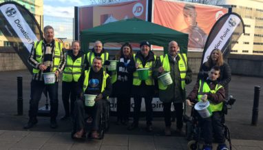 Members of the foodbank team with the NUFC fans foodbank collecting donations at a football match